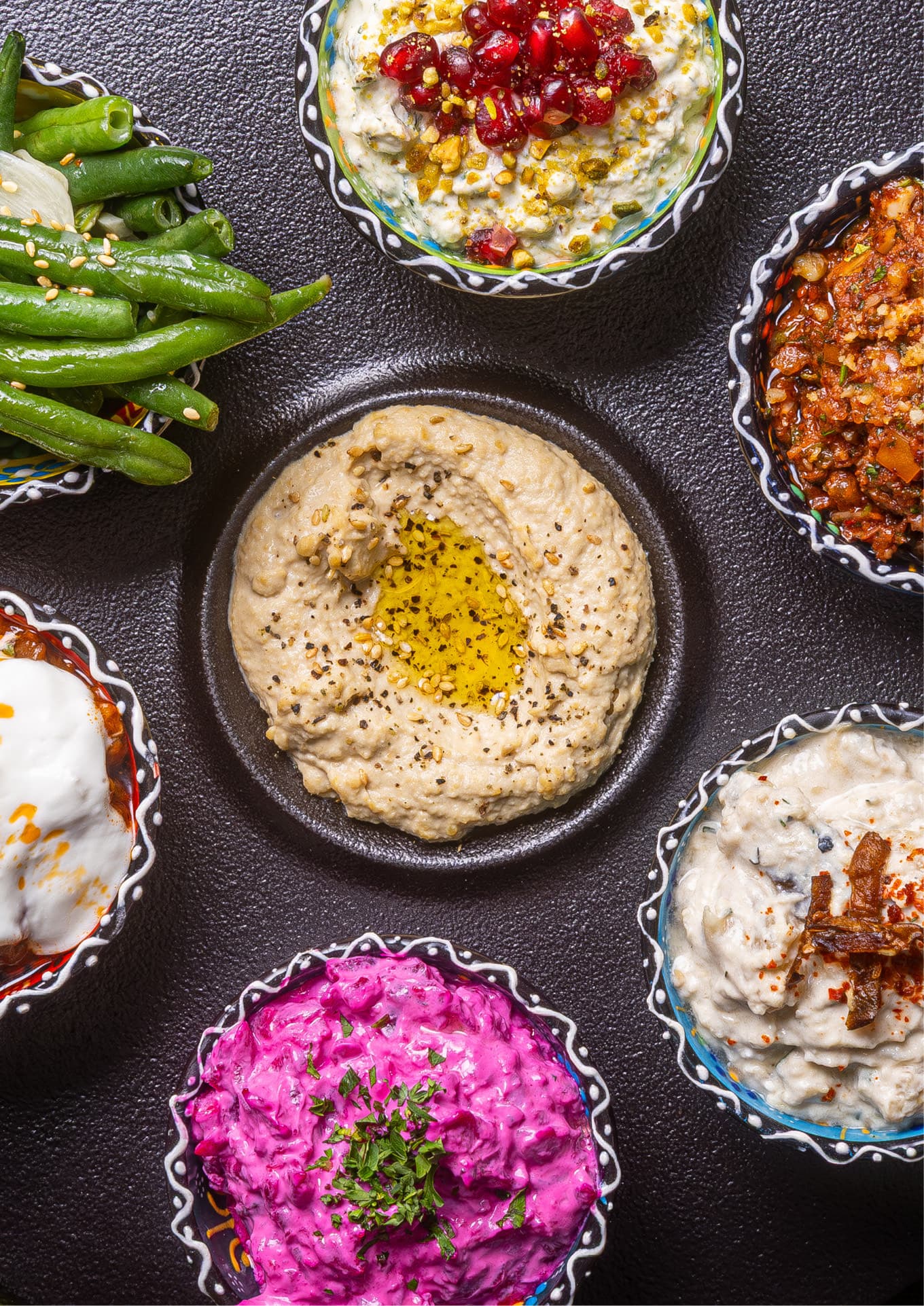Mezze spread with colorful dips and dishes